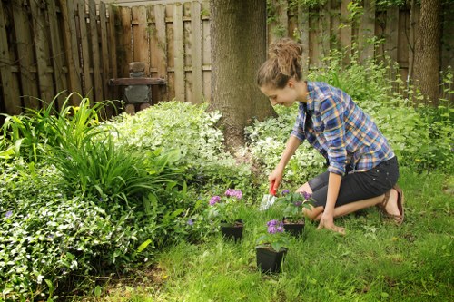 Satisfied customers enjoying their cleared garden